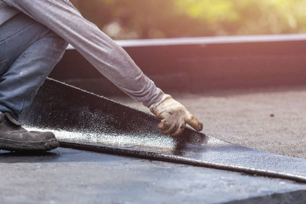 Professional Waterproofing technician working in Albany, OR